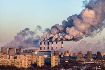 smokestacks spewing smoke